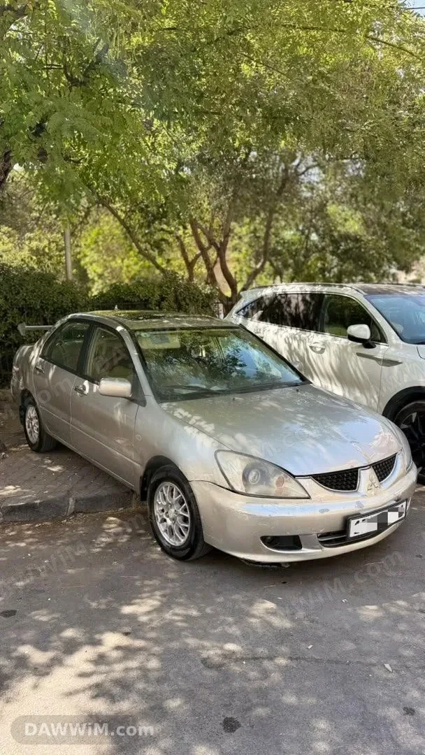 ميتسوبيشي لانسر - Mitsubishi Lancer 2004