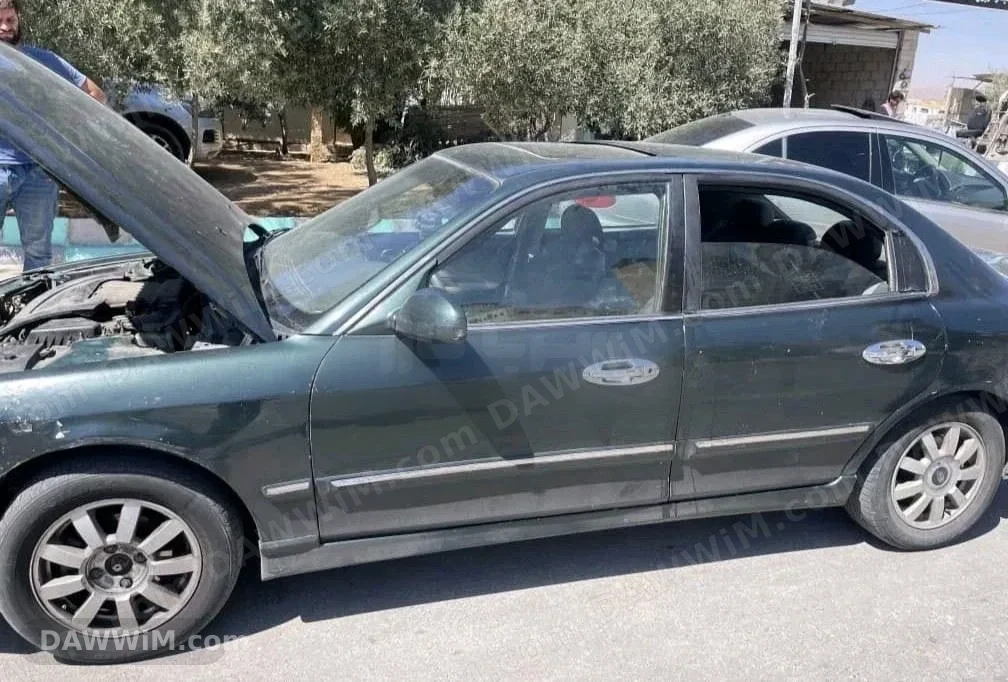كيا اوبتيما 2002