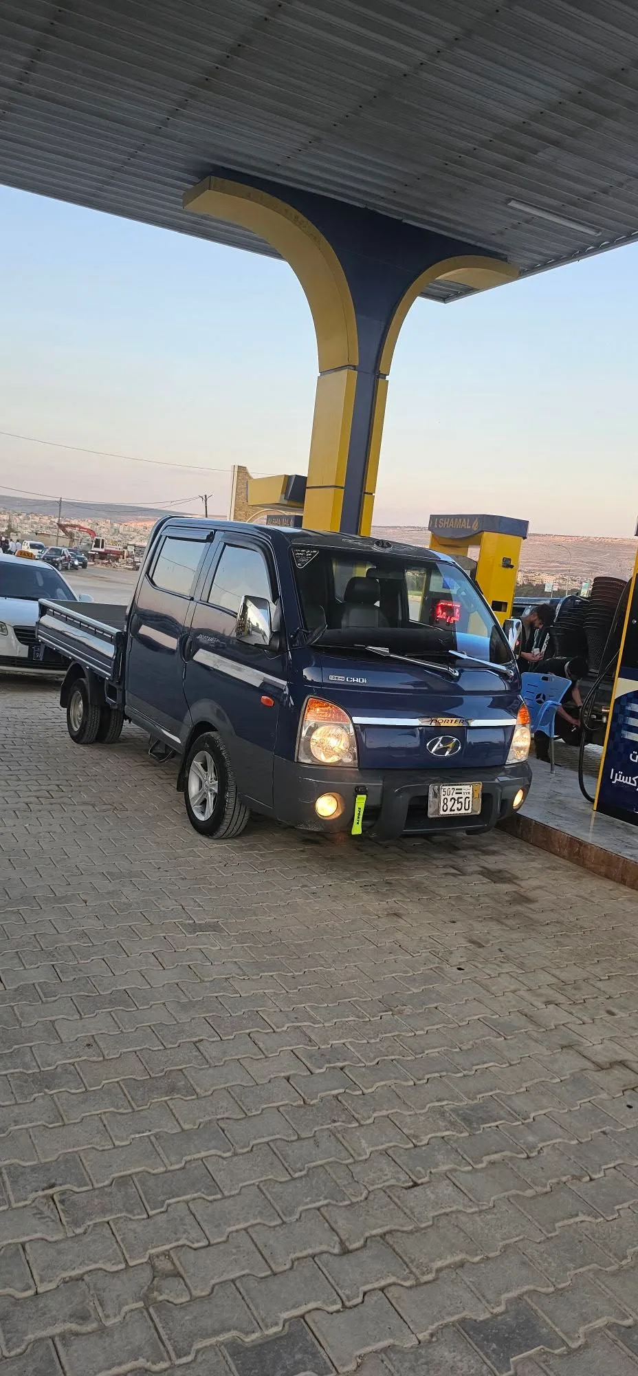 هيونداي بورتر 2009، موتور 126، أربع أبواب
