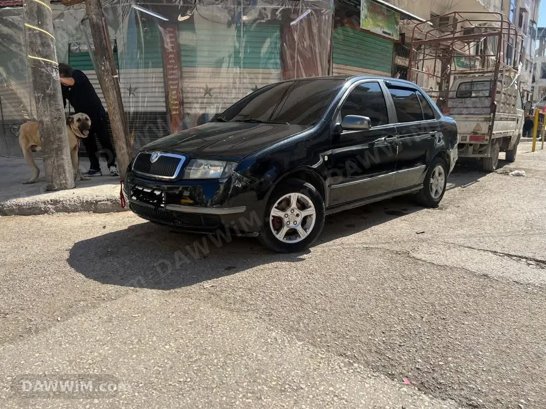 سكودا فابيا للبيع - أوتوماتيك، محرك 4 سلندر، مكيف بارد