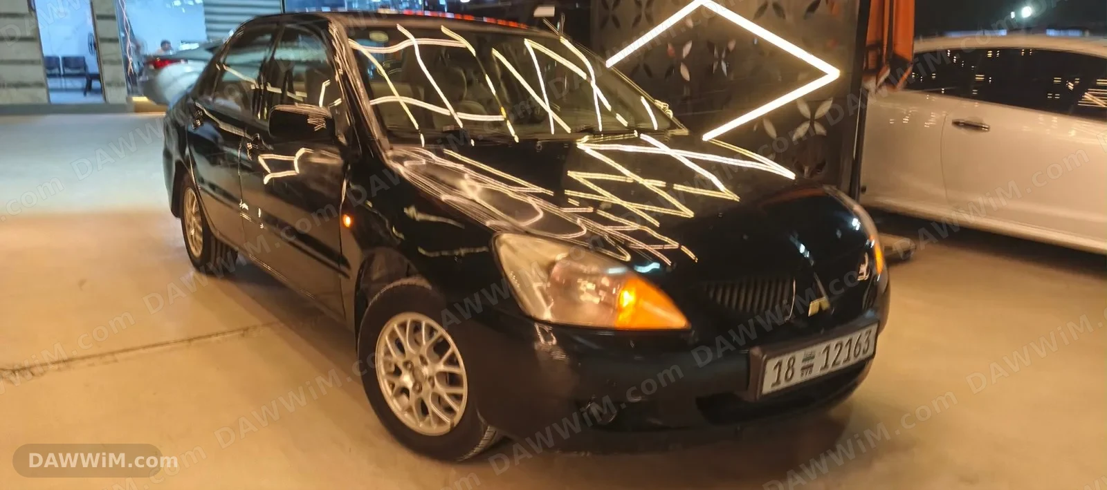 سيارة ميتسوبيشي لانسر 2006 للبيع