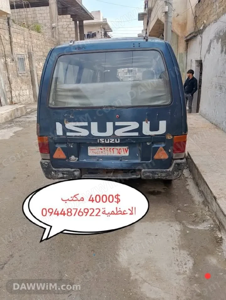 باص إيسوزو عمومي 14 راكب للبيع في حلب