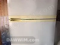 ثلاجة مستعملة بابين مع فريزر علوي