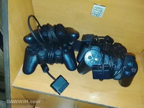 بلايستيشن 2 مستعمل بحالة جيدة مع ملحقات