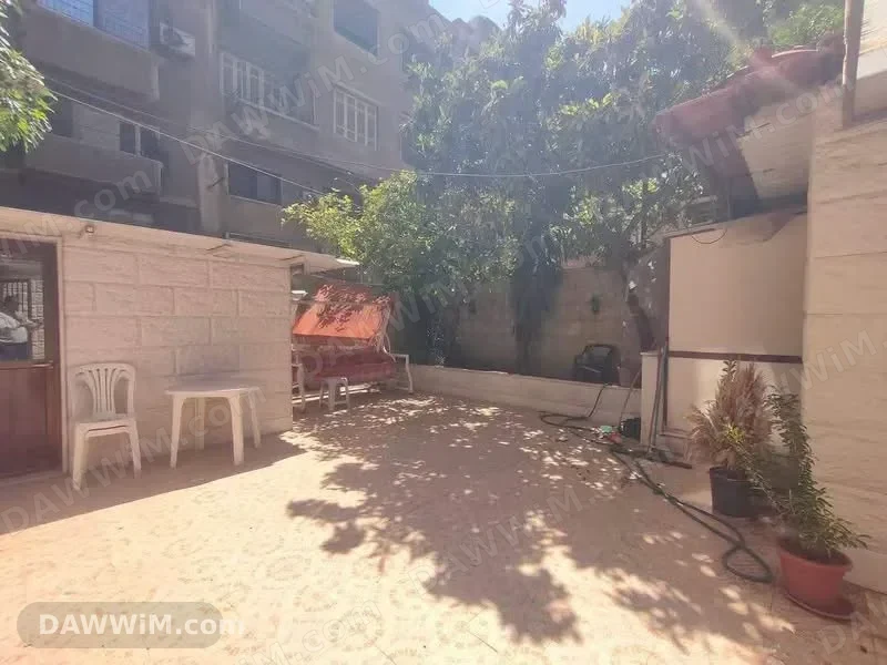 شقة مفروشة أرضية مع حديقة للبيع في منطقة التجارة - دمشق