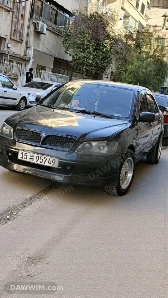 ميتسوبيشي لانسر موديل 2003