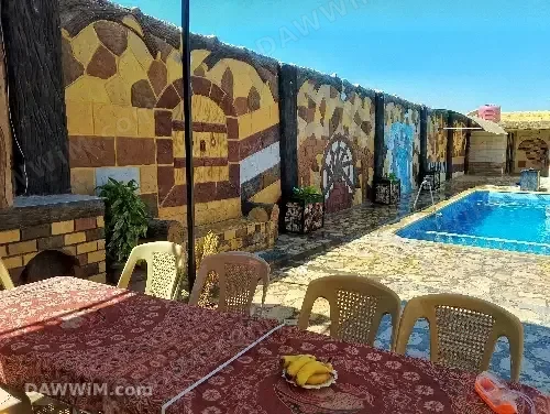 مزرعة للبيع على طريق حمص من جهة سريحين - حماة