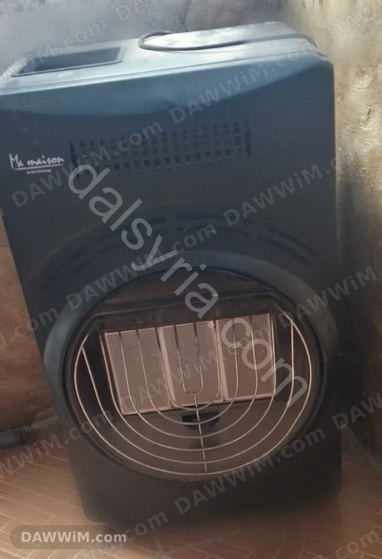 مدفأة غاز وكهرباء مستعملة بحالة ممتازة