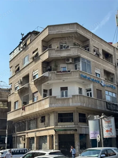 بناية تجارية وسكنية للبيع في دمشق - شارع 29 أيار